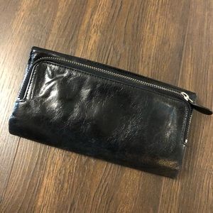 Latico black leather clutch